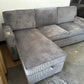 Sectional with pullout and reversible storage chaise