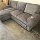 Sectional with pullout and reversible storage chaise