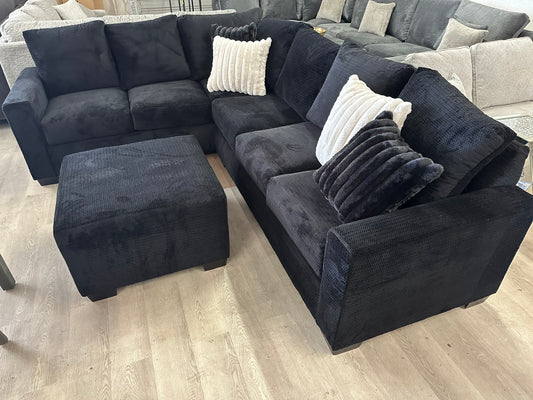 Black sectional with ottoman