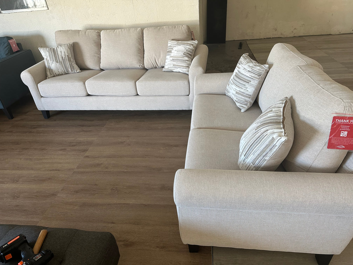 Beige sofa and loveseat set